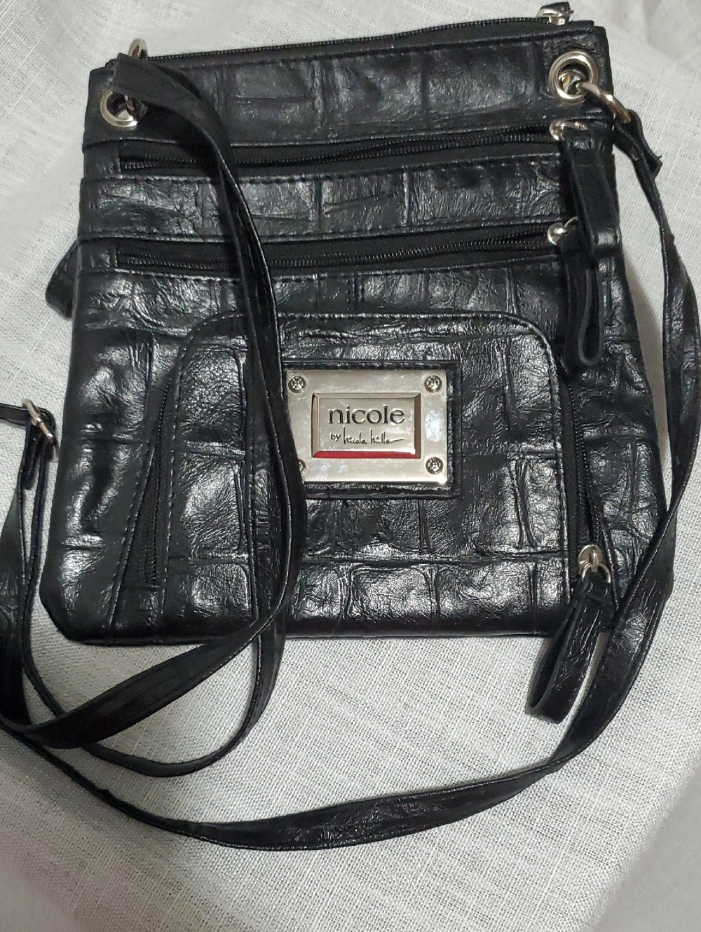 Nicole by Nicole Miller Black Textured Crossbody Bag with Metal Logo Plate